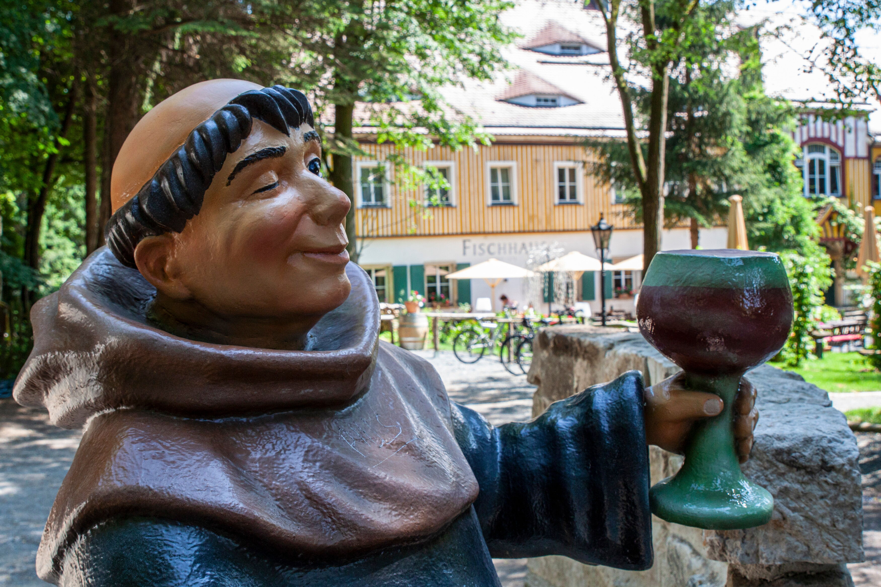 A monk welcomes the guests in the historic Fischhaus in Dresden